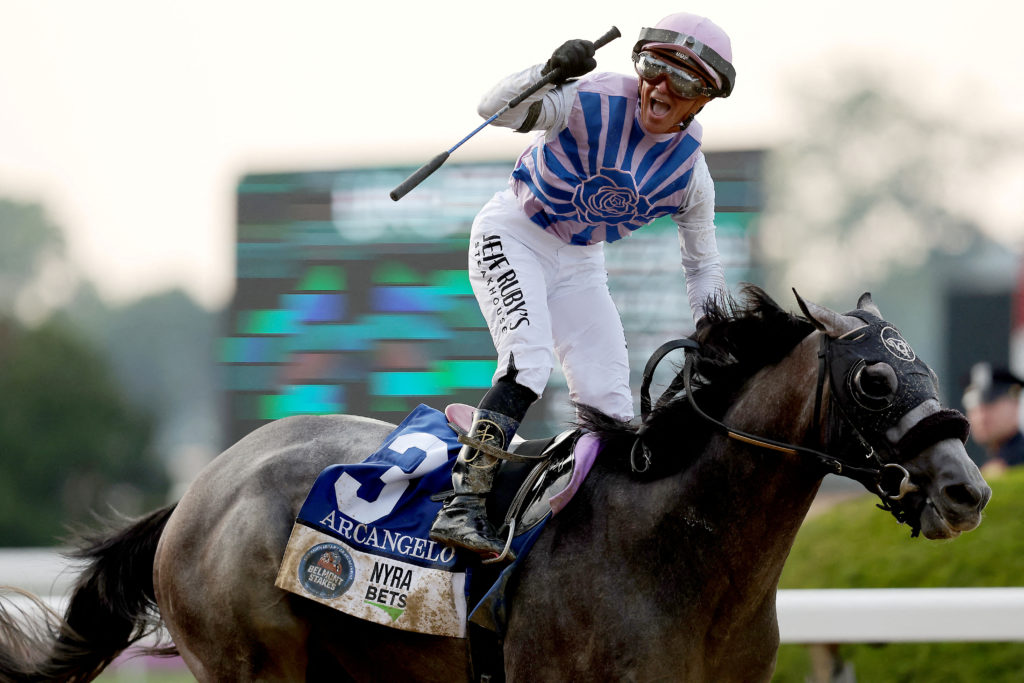 A thoroughbred and jockey winning a feature stakes race that pays a healthy dividend